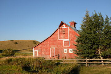 Fototapeta na wymiar Weathered barn at golden hour