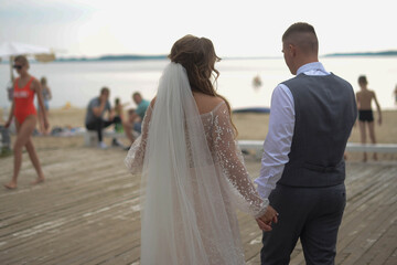 wedding young couple looking back