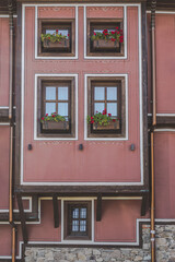 Pink building with beautiful windows