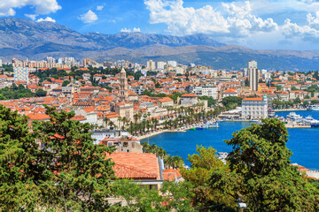 Fototapeta na wymiar Coastal summer cityscape - top view of the city of Split, the Adriatic coast of Croatia