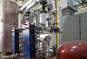 Heating system boiler room equipments. Boilers, pressure gauges and pipes