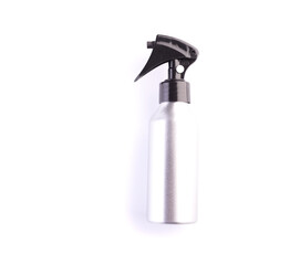 Cosmetic spray bottle isolated on white background. Closeup of plastic container for hair care or skincare with trigger pump. Aerosol jar, beauty salon tool