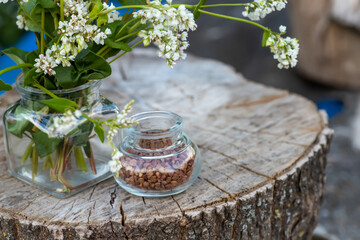 Transparent jar for loose products with dry buckwheat.