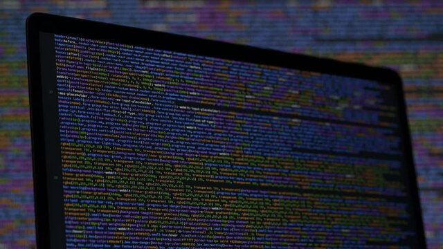 Real CSS code. Front end web development. CSS code on laptop screen. Web design concept.