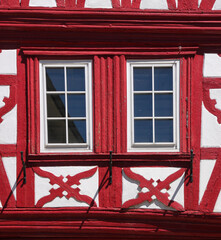 Renaissance window frame on a half-timbered house facade in the old town of Meisenheim in Germany