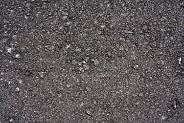 The texture of the new black asphalt as a background.
