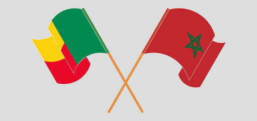Crossed and waving flags of Benin and Morocco