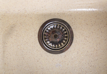 Fresh and clean beige sink and silver water filter