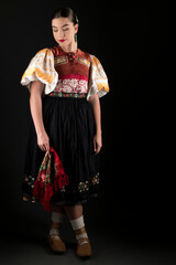 Slovak folklore. Slovakian folklore girl. Beuatiful young girl in slovak folk dress