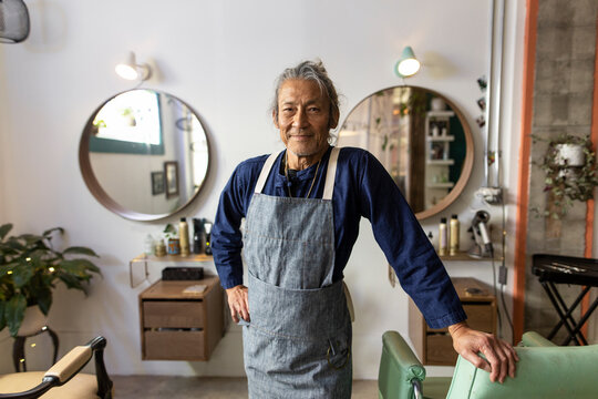 Portrait of hairdresser owner in startup salon