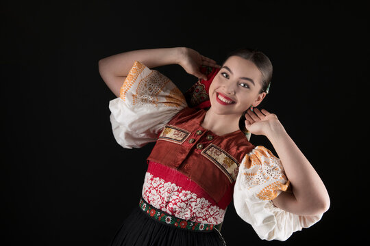 Young beautiful slovak woman in traditional dress. Slovak folklore