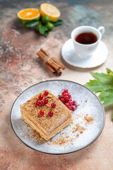 front view yummy cake slice with red berries on light background pie sweet biscuit cake