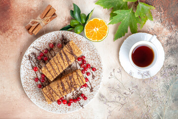 top view cake slices with berries and tea on light background sweet cake fruit biscuit
