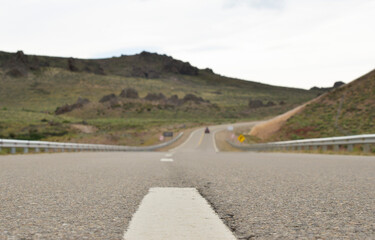 paved mountain road, in perspective with curves