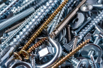 Mixed screws and nails. Industrial background. Home improvement.bolts and nuts.Close-up of various...