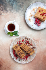 top view yummy cake slice with tea and berries on a light background cake biscuits sweet