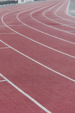 Red track at athletics stadium