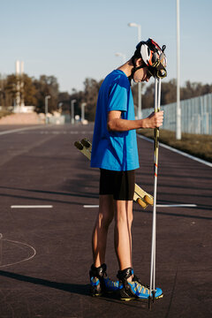 Teen athlete ready for roller skiing workout