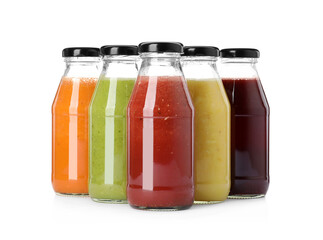 Bottles of fresh juices on white background