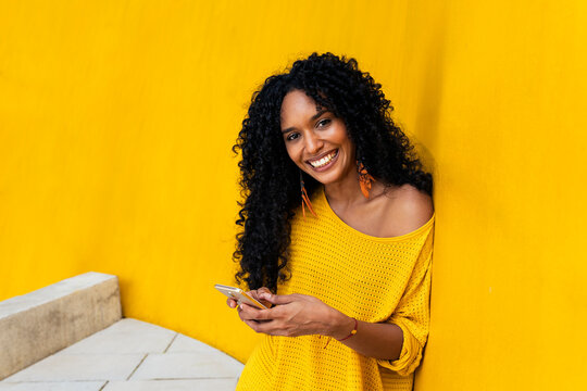 Young woman texting cellphone