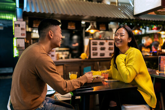 Chinese couple at a restaurant.