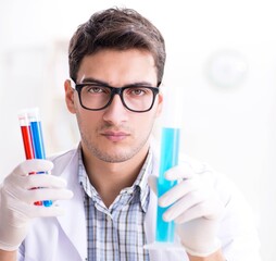 Chemistry student doing chemical experiments at classroom activi