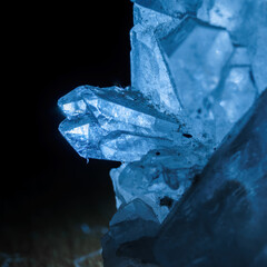 detail of transparent rock crystal illuminated from behind