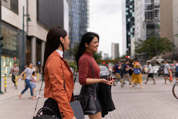 Two asian colleagues