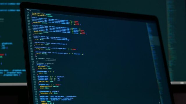 Real CSS code. Front end web development. CSS code on laptop screen. Web design concept.