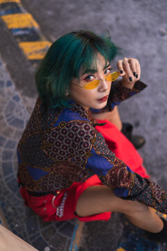 Asian girl with green hair