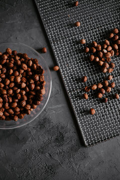 Hazelnuts in bowl and on grating