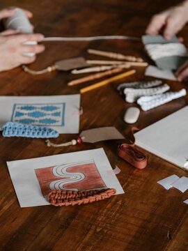 Paper drawings with rug ornaments in craft studio