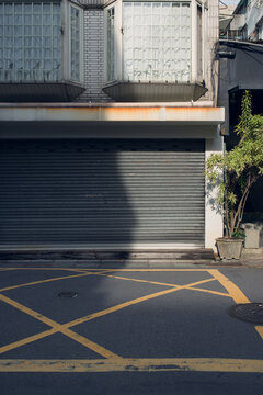 The front of a closed shop in a small town in japan.