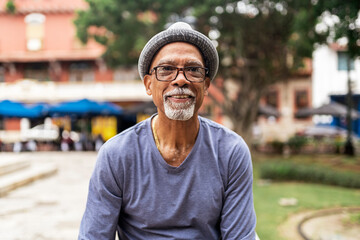 Senior black man smiling.