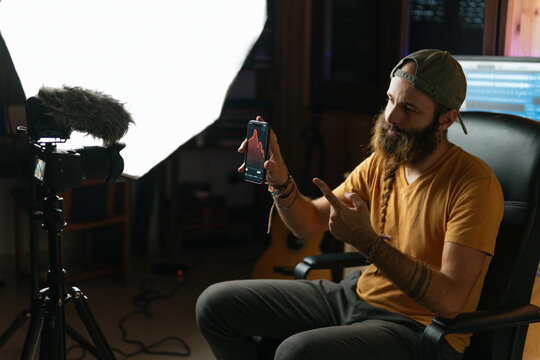 Man making a video indoors