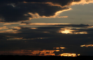 Dramatic evening sky with dark clouds
