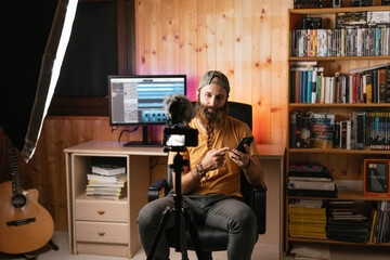 Man making a video indoors