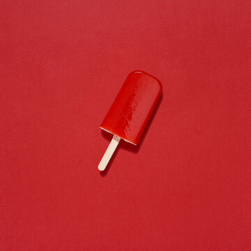 Homemade frozen strawberry popsicle