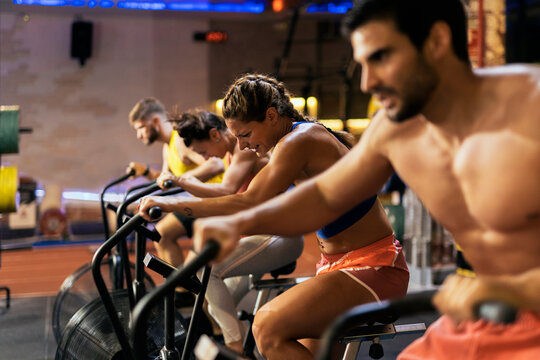 Side View of People Working Out at Gym