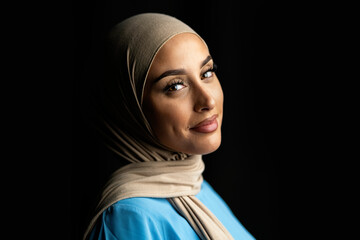 Portrait of Muslim Woman Touching Her Face
