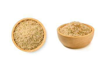 Brown rice in wooden bowl on white background.