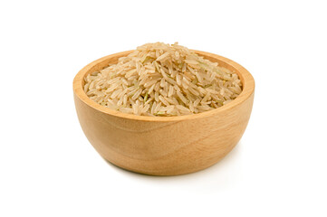 Rice grains in wooden bowl isolated on white background.
