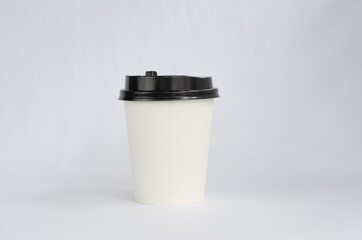 photo white cup plain on white background , mock up glass plastic