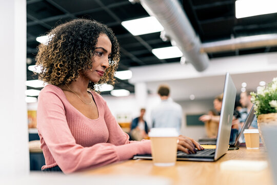 Curly Hair Business Woman Working in Office