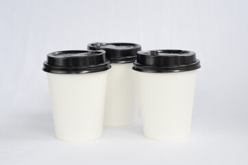 photo white cup plain on white background , mock up glass plastic