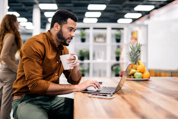 Portrait of Business Man Using Laptop