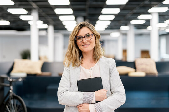 Portrait of Business Woman Looking at Camera