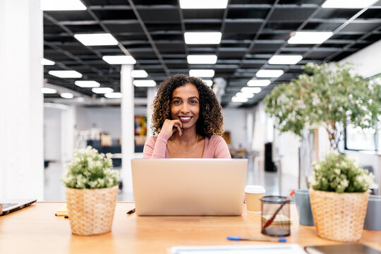 Portrait of Curly Hair Business Woman Smiling