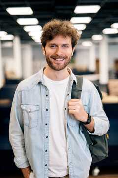 Portrait of Handsome Business Man Looking At Camera