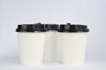 photo white cup plain on white background , mock up glass plastic